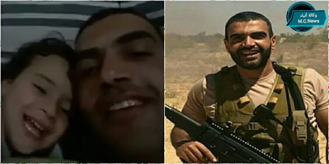 الشهيد أحمد المنسي لحظة مداعبة ابنته